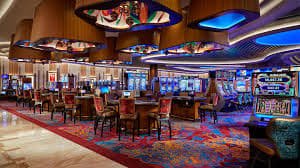 Interface aplikasi totopaedi menampilkan tabel live dealer dan menu navigasi